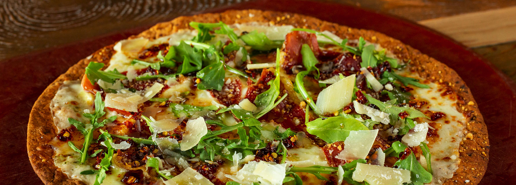 Round flatbread pizza served at Napa Kitchen & Bar.